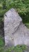 Commemorative stone with the text almost illegible.