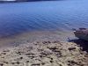 Beach at the summer home after being dredged and with new sand.